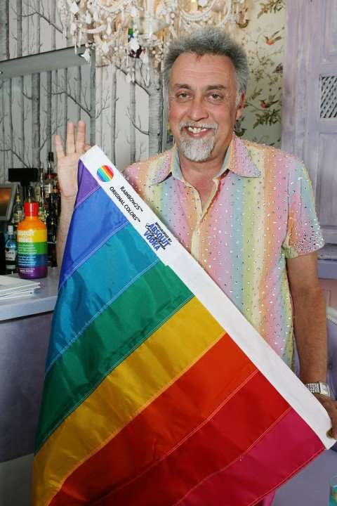 gilbertbaker-with-8-color-pride-flag